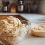 Side-by-side comparison of cookie dough and cake batter on a kitchen counter.